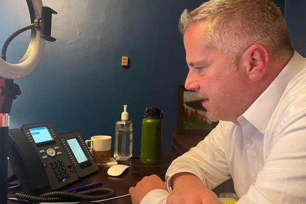 Congressman Sorensen answers a constituent's question from his Washington, D.C., office during a telephone town hall event Thursday