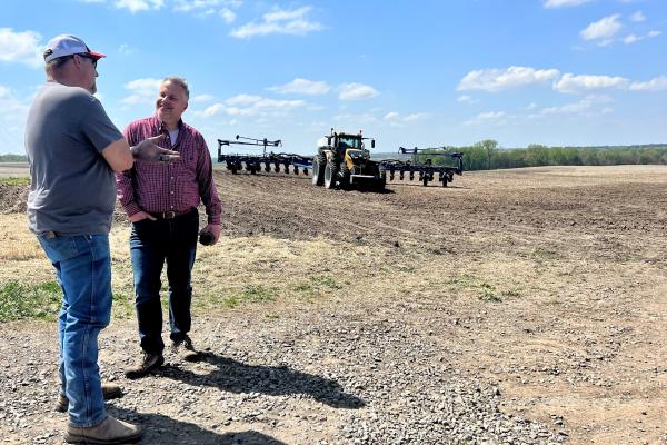 Rep. Sorensen speaks with a farmer in Mercer County