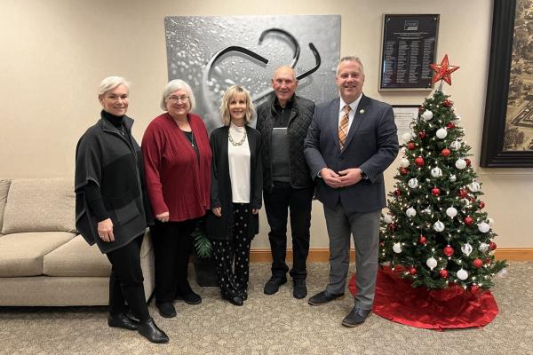 Sorensen joins company leaders during a tour of Cook Medical in Canton 