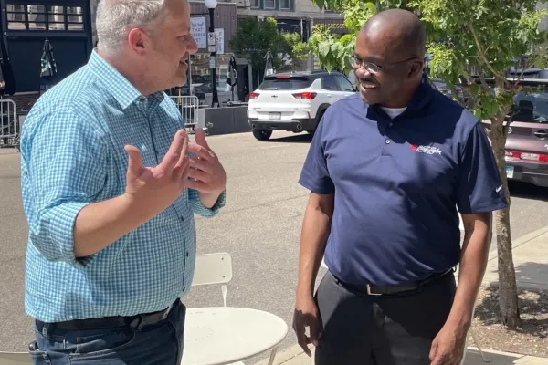 U.S. Rep. Eric Sorensen, left, with Bloomington Mayor Mboka Mwilambwe in downtown Bloomington on Friday, May 5, 2023.