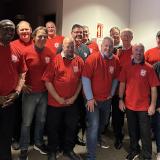 Sorensen with UAW workers and local leaders at picket line event in Belvidere.