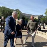 Rep. Eric Sorensen (IL-17) greets Army Secretary Daniel Driscoll at the Rock Island Arsenal with Congresswoman Mariannette Miller-Meeks.