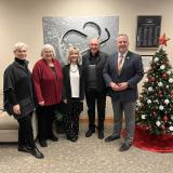 Sorensen joins company leaders during a tour of Cook Medical in Canton 